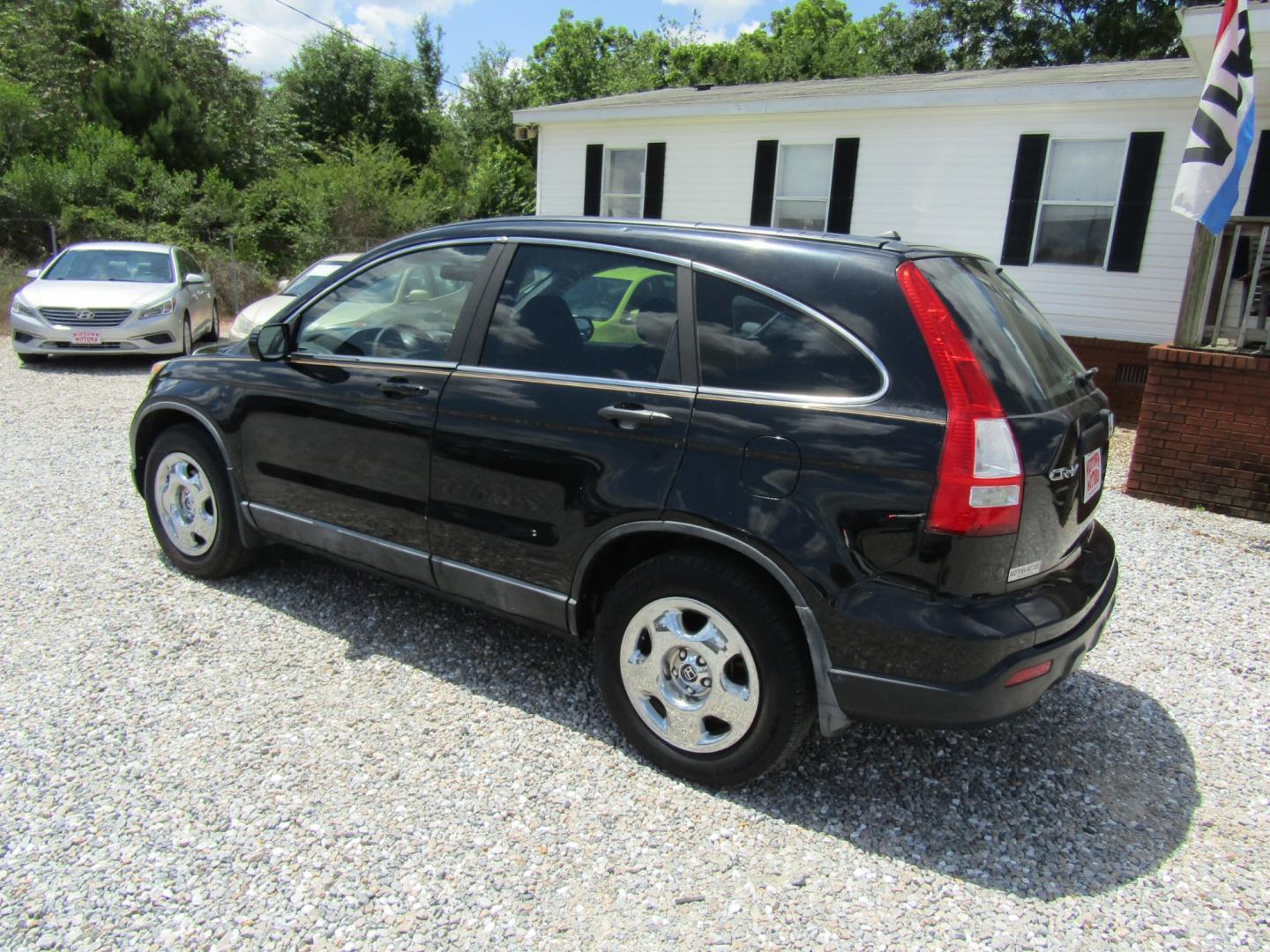 2009 Black /Gray Honda CR-V LX 2WD 5-Speed AT (5J6RE38369L) with an 2.4L L4 DOHC 16V engine, Automatic transmission, located at 15016 S Hwy 231, Midland City, AL, 36350, (334) 983-3001, 31.306210, -85.495277 - Photo#5